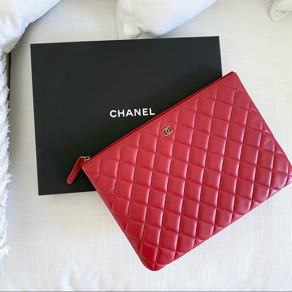 CHANEL Handbags - Chanel Medium O Case Clutch